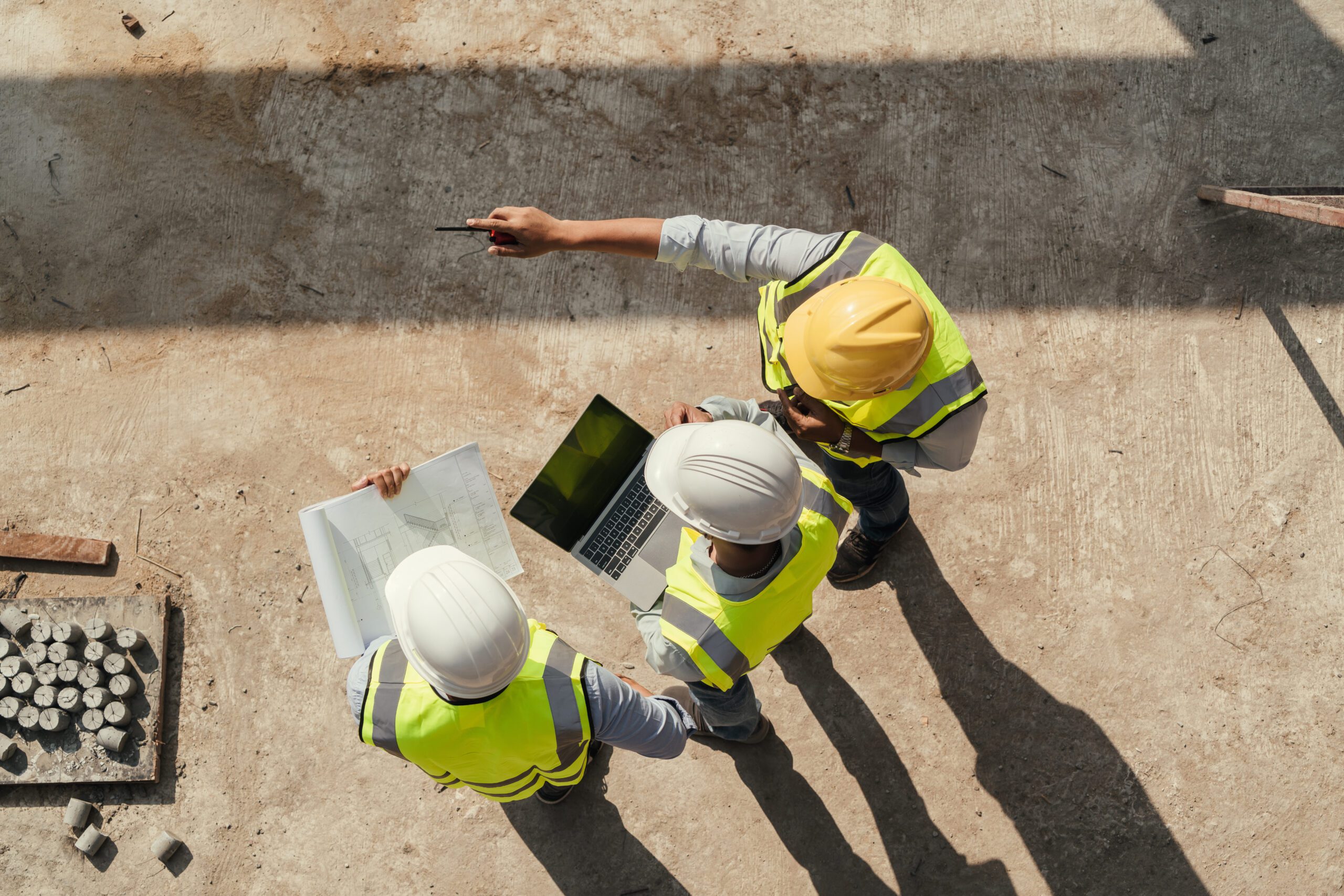 Top view, Team engineer building inspection use tablet computer